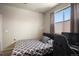 Cozy bedroom featuring a double bed and workspace at 17395 Leisure Lake Dr, Monument, CO 80132