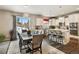 Kitchen and dining area with access to backyard at 17395 Leisure Lake Dr, Monument, CO 80132