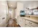 Clean hallway with built-in shelving and storage at 17395 Leisure Lake Dr, Monument, CO 80132