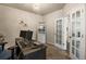 Bright home office with double doors and window at 17395 Leisure Lake Dr, Monument, CO 80132