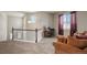 Open loft area overlooking the main floor at 17395 Leisure Lake Dr, Monument, CO 80132