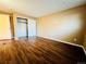 Bedroom showing a closet and light brown walls, lit by natural light at 1049 W 112Th Ave # A, Denver, CO 80234