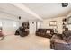 Basement features multiple couches and chairs, creating a cozy and inviting living space at 1488 W 102Nd Ave, Northglenn, CO 80260
