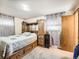 Cozy bedroom with built-in storage and neutral décor at 1488 W 102Nd Ave, Northglenn, CO 80260