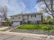 Attractive home featuring a lush lawn, charming exterior, and a welcoming neighborhood feel at 1488 W 102Nd Ave, Northglenn, CO 80260