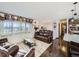Inviting living room with hardwood floors, stylish furniture, and abundant natural light at 1488 W 102Nd Ave, Northglenn, CO 80260