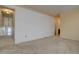 Carpeted bedroom with access to a hallway at 112 S Holman Way, Golden, CO 80401