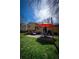 Outdoor patio area with comfortable seating, ideal for enjoying the backyard and al fresco dining at 1562 Madison Ct, Louisville, CO 80027