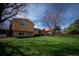 Spacious backyard with patio and generous lawn area, great for outdoor entertaining and relaxation at 1562 Madison Ct, Louisville, CO 80027