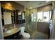 Functional bathroom featuring a vanity, toilet, and walk-in shower at 1562 Madison Ct, Louisville, CO 80027