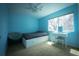 Cozy bedroom featuring a bed with storage drawers, a vanity, and a sunny window at 1562 Madison Ct, Louisville, CO 80027