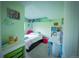 Bright bedroom with built-in shelving and storage space at 1562 Madison Ct, Louisville, CO 80027