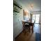 Dining area with wood floors and a table with four chairs at 1562 Madison Ct, Louisville, CO 80027
