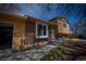 Inviting home with brick and siding exterior, walkway, and landscaping at 1562 Madison Ct, Louisville, CO 80027