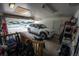 Spacious garage with ample room for parking and storage, offering convenience and organization at 1562 Madison Ct, Louisville, CO 80027