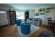 Bright living room with lots of natural light, modern decor, and hardwood floors at 1562 Madison Ct, Louisville, CO 80027
