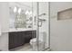 Modern bathroom with a glass shower, sleek vanity, and tiled accents at 1201 N Williams St # 3A, Denver, CO 80218