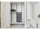 Walk in closet featuring built in organization and storage with shelving and drawers at 1201 N Williams St # 3A, Denver, CO 80218