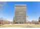 A full, straight on exterior shot of the building, on a beautifully sunny day at 1201 N Williams St # 3A, Denver, CO 80218
