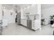 Contemporary kitchen with stainless steel appliances, white cabinets, and a clean, functional design for modern living at 1201 N Williams St # 3A, Denver, CO 80218