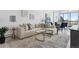 Bright living room with a comfortable sectional sofa, stylish decor, and a view at 1201 N Williams St # 3A, Denver, CO 80218