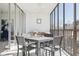 Enclosed patio with a dining table and chairs, providing an ideal space for relaxation or entertaining guests at 1201 N Williams St # 3A, Denver, CO 80218