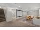 Finished basement offers a comfortable living area with a movie screen at 1035 S Garfield St, Denver, CO 80209
