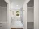 Bathroom with marble floors and walk in closet at 1035 S Garfield St, Denver, CO 80209