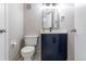 Bathroom featuring a modern vanity, toilet, and clean finishes at 12743 Eudora Dr, Thornton, CO 80241