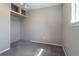 This bedroom offers neutral paint, carpet, and a sunny window at 12743 Eudora Dr, Thornton, CO 80241