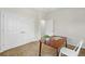 Bedroom with carpet, a closet, and a wooden desk and chair at 2360 Santa Fe Dr # B, Longmont, CO 80504