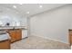Bright kitchen featuring stainless appliances, granite countertops and views of the living room at 2360 Santa Fe Dr # B, Longmont, CO 80504