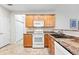Bright kitchen with stainless steel appliances, updated counters, and plenty of storage at 2360 Santa Fe Dr # B, Longmont, CO 80504