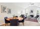 Open-concept living space boasts plenty of natural light and a cozy fireplace at 2360 Santa Fe Dr # B, Longmont, CO 80504