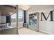 Bright bedroom with bunkbeds, a stylish light fixture, a bookcase, and a view at 20 Wilcox St # 302, Castle Rock, CO 80104