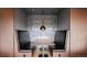 Cozy booth with black leather seats and a modern light fixture, perfect for intimate dining at 20 Wilcox St # 302, Castle Rock, CO 80104