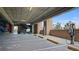 Public parking garage with EV charging stations and stairs to other floors at 20 Wilcox St # 302, Castle Rock, CO 80104