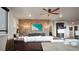 Inviting living room with exposed brick, leather sofa, and stylish lighting, offering a blend of modern comfort and rustic charm at 20 Wilcox St # 302, Castle Rock, CO 80104