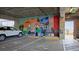Parking garage features a colorful mural and EV charging station at 20 Wilcox St # 302, Castle Rock, CO 80104