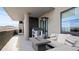 Outdoor patio featuring a modern fire pit, comfortable seating, and stylish decor at 20 Wilcox St # 302, Castle Rock, CO 80104