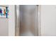 Enclosed walk-in shower showcases modern fixtures and neutral finishes at 2353 S Jamaica St, Aurora, CO 80014