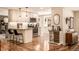 Modern kitchen featuring granite countertops, white cabinets, and stainless steel appliances at 6963 E Heritage S Pl, Centennial, CO 80111