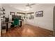 Office space with hardwood floors, natural light, and a large desk at 6963 E Heritage S Pl, Centennial, CO 80111
