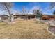 Charming single-story home featuring a brick facade and well-maintained front yard and driveway at 9180 Raleigh St, Westminster, CO 80031