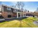 A sprawling backyard and patio grace the home's back exterior, with ample space for recreation and outdoor living at 1835 S Poplar St, Denver, CO 80224