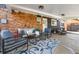Inviting covered patio with cozy seating area, perfect for outdoor relaxation at 1835 S Poplar St, Denver, CO 80224
