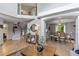 Spacious floor plan including the living room, dining area, and staircase, creating an open and inviting atmosphere at 19935 E Stanford Dr, Centennial, CO 80015