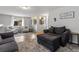 Inviting living room with plush seating, a neutral color palette, and bright natural light at 19935 E Stanford Dr, Centennial, CO 80015