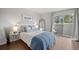 Cozy bedroom with a sliding glass door to an outdoor patio and plenty of natural light at 4882 W 68Th Ave # 4, Westminster, CO 80030