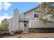 Charming home exterior featuring gray siding, well-maintained landscaping, and inviting front entrance at 4882 W 68Th Ave # 4, Westminster, CO 80030